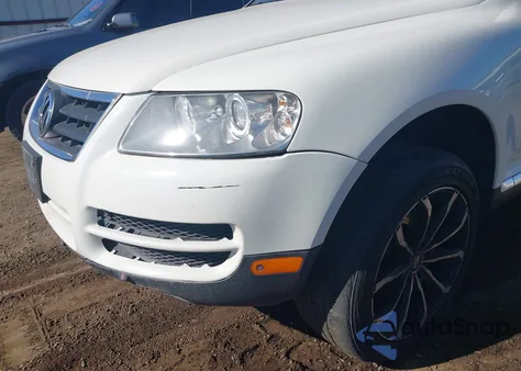 2007 Volkswagen Touareg V6 z USA, uszkodzony, nr VIN WVGZE77LX7D056124